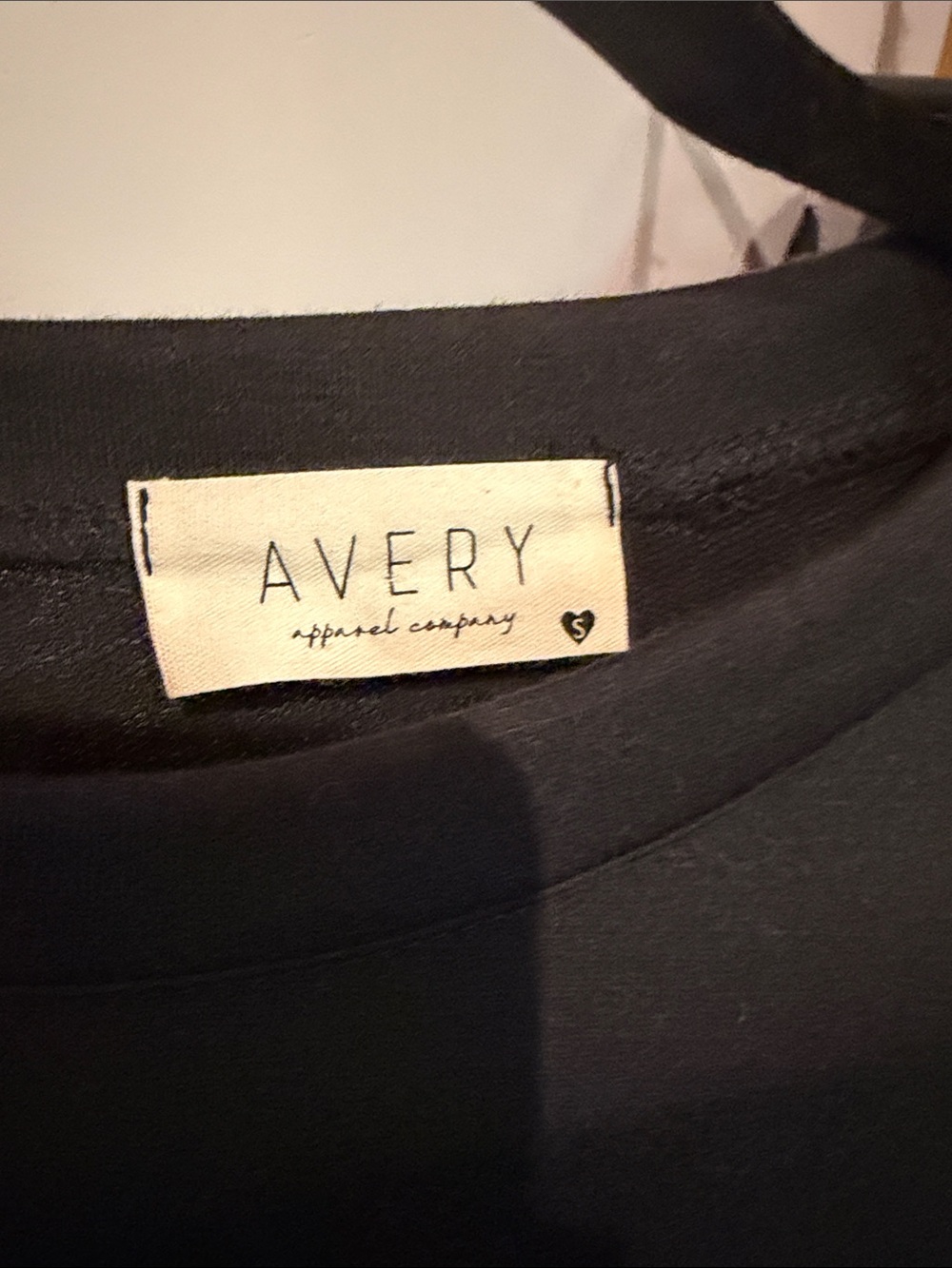 Avery Black Top with Black-and-White Cow Print Raglan Sleeves - Picture 2 of 3
